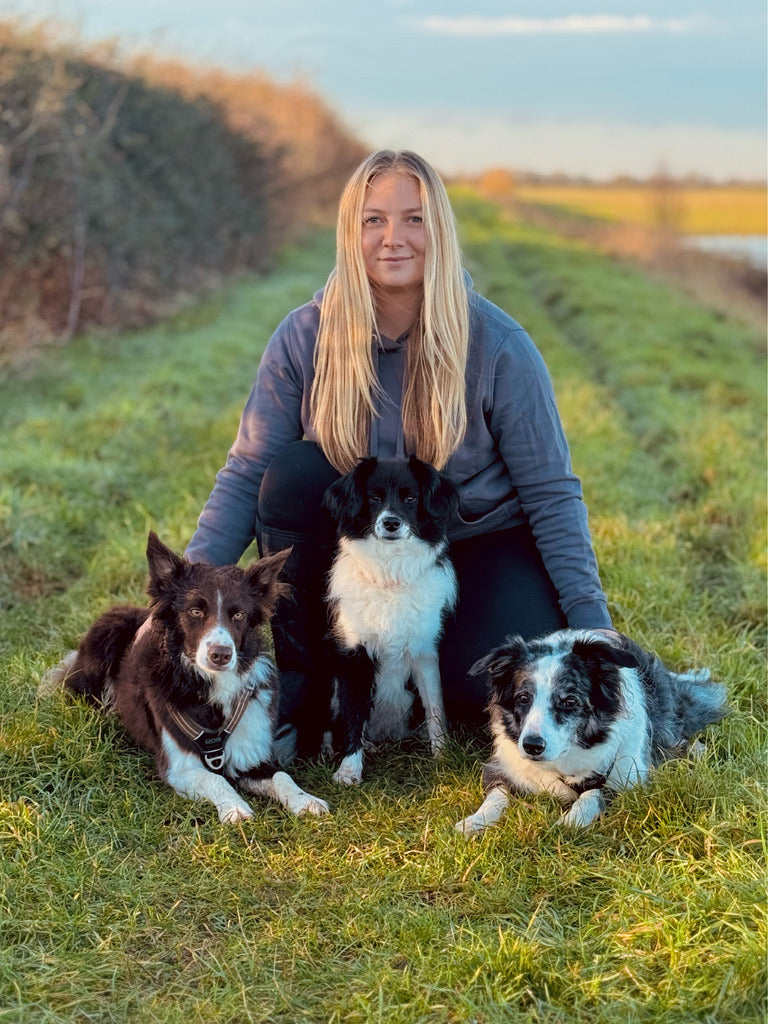 Woman with 3 dogs